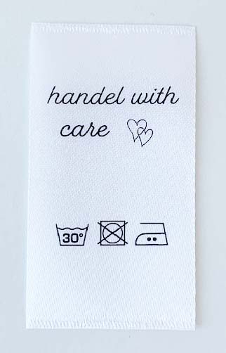 Satinlapp Handel with care
