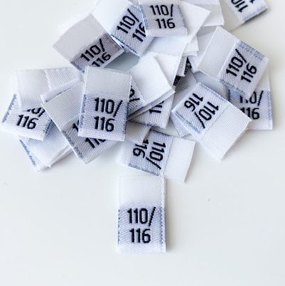 Vit vävd vikt storlekslapp 110/116 - 2