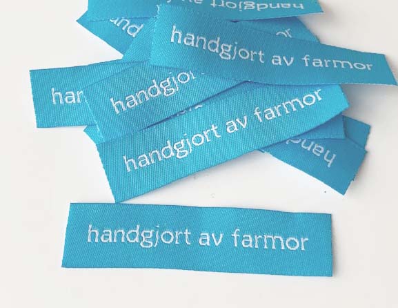 Woven straightcut label Farmor turquise