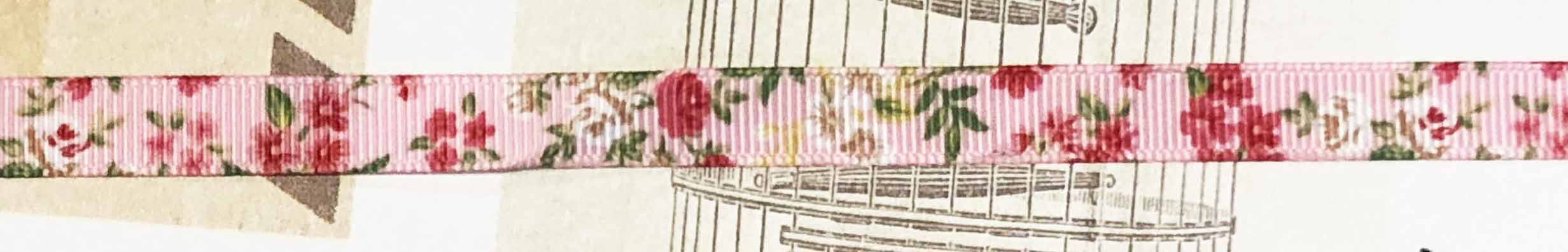 Printed ribbon flowers on pink 10mm
