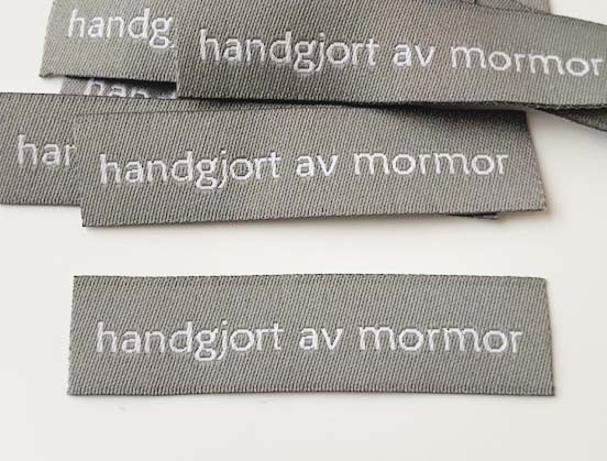 Vävd enkel lapp Handgjord av mormor grå