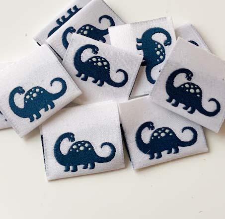 Woven folded label Dino