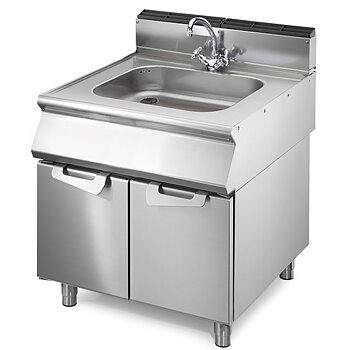 Washbasin on cabinet with doors