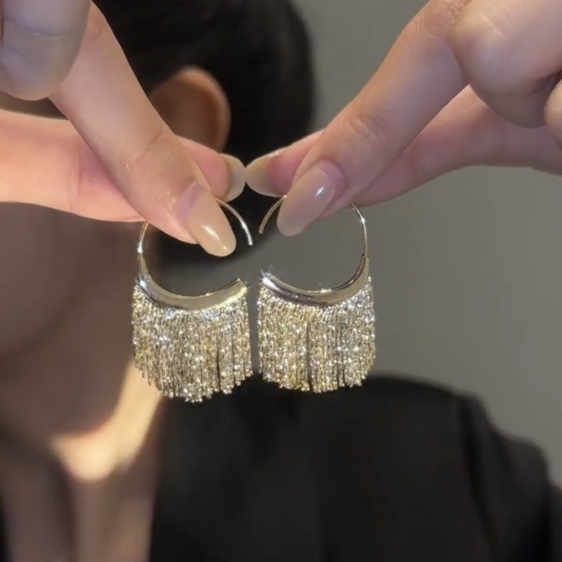 VACC Long tassel earrings gold