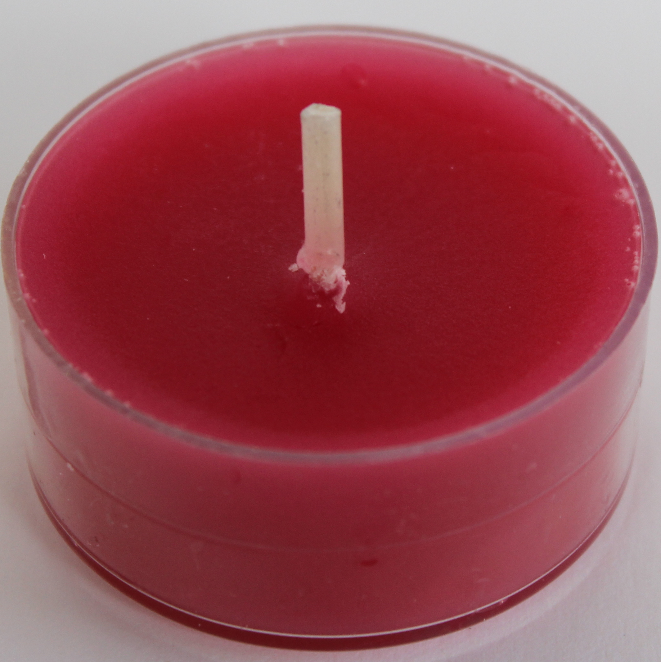 Värmeljus i plastkopp cerise