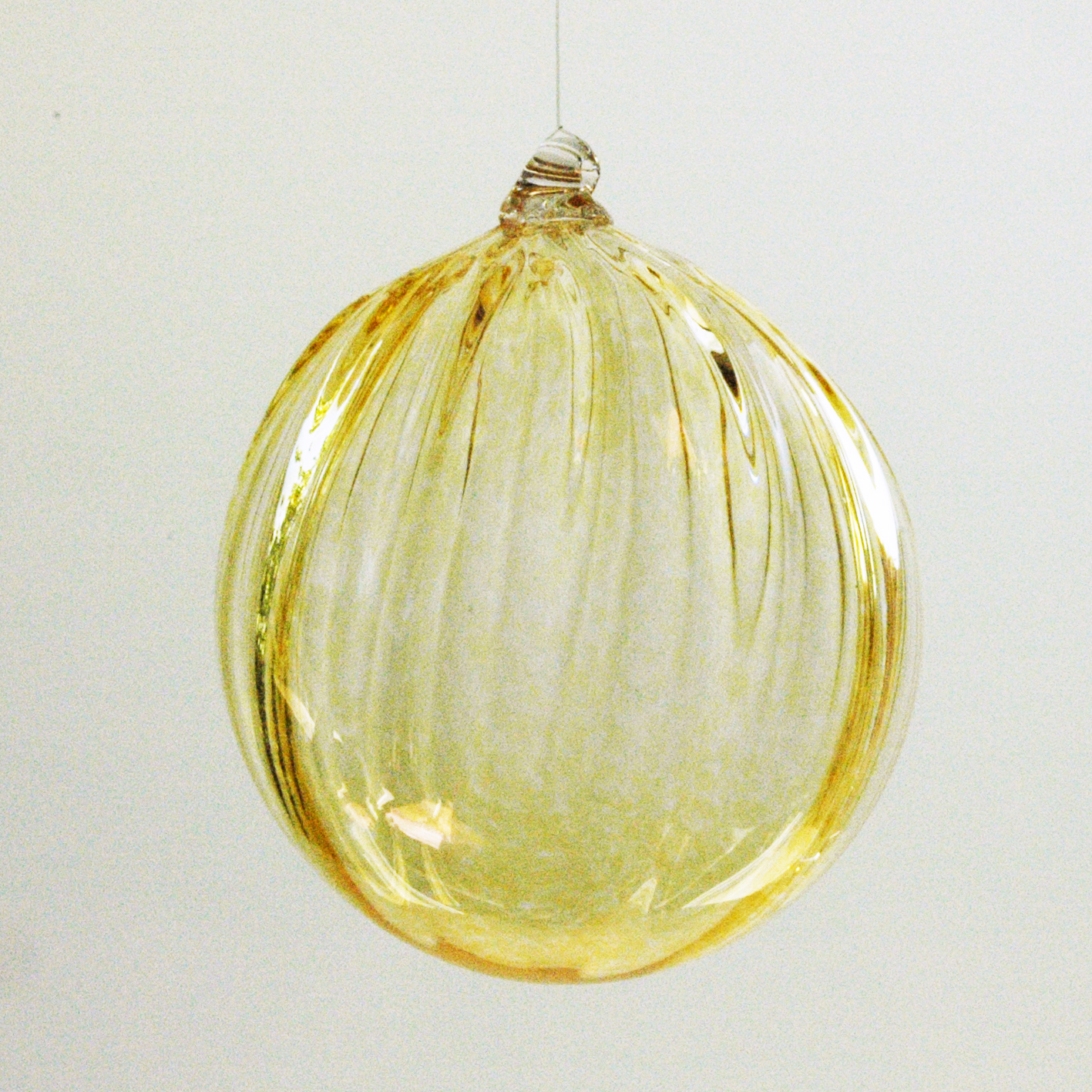 Glass ball, saffron.