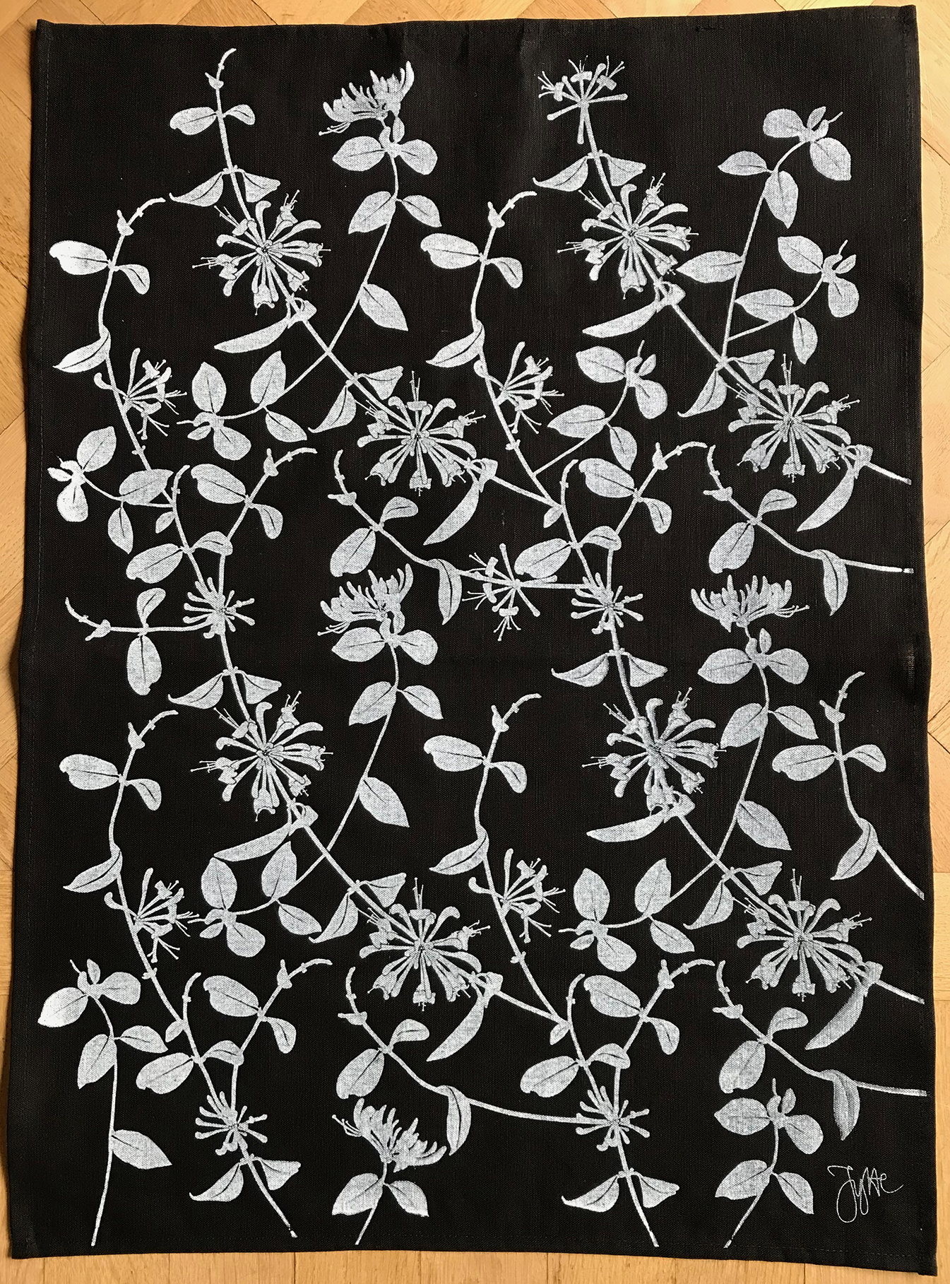 Towel honeysuckle black background
