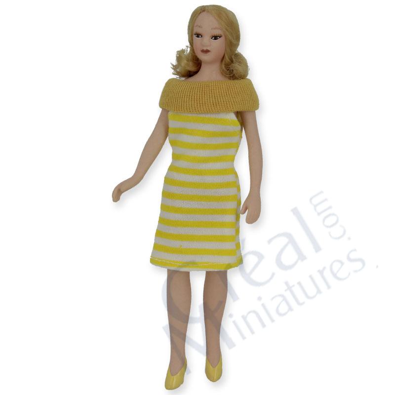 doll girl yellow dress