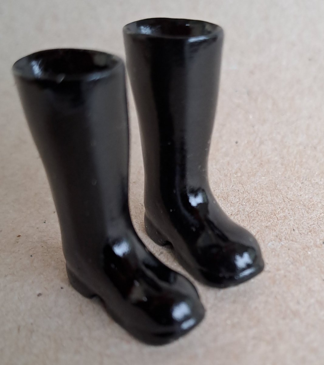 Child's black Wellington boots