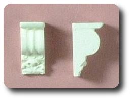 A pair of brackets - hard casting plaster