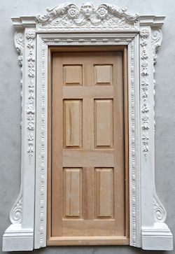 Decoration to a door -  hard casting plaster