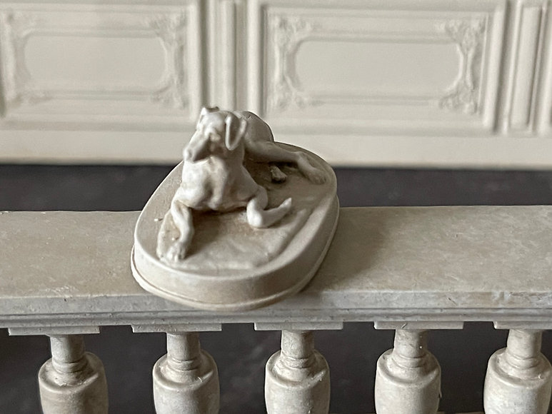 Statue of a lying dog -  from Alison Davies - 2