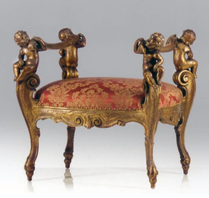En "snidad" stol 1860 med putti- omålad av resin - från Alison Davies - 2