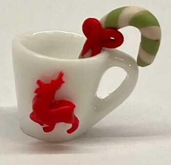 Christmas mug with green polka dot stick - handmade in England