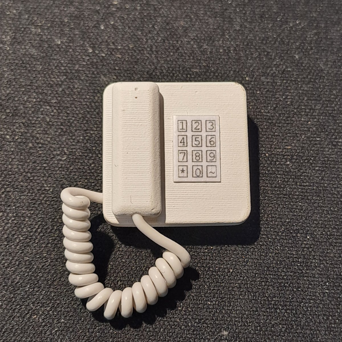 Telefon vit