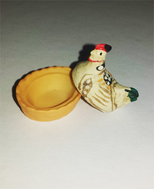 Hen with bowl