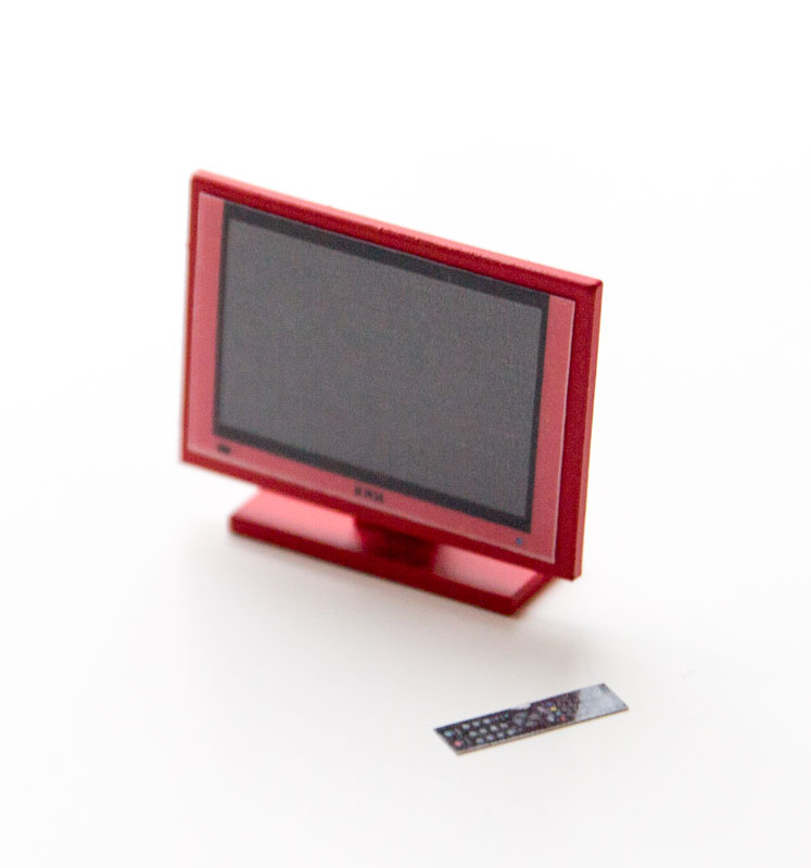 Flatt scren TV with remote controll red