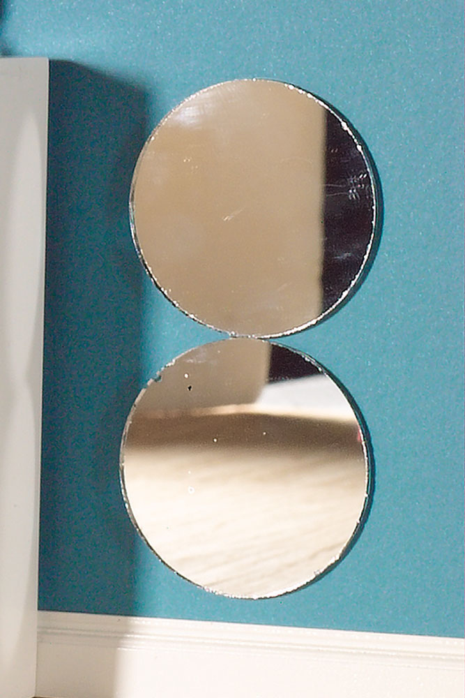 2 round mirrors