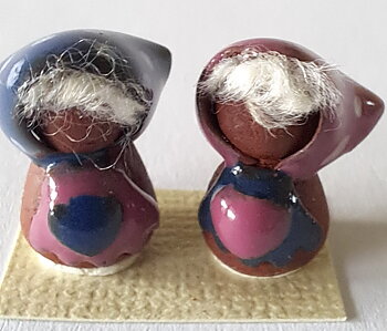 Two handmade - ceramics old woman