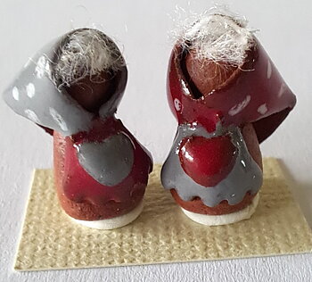 Two handmade - ceramics old woman