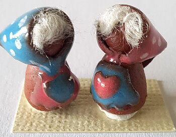 Two handmade - ceramics old woman