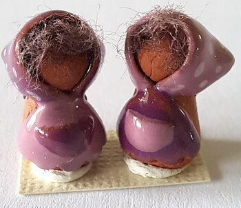 Two handmade - ceramics old woman