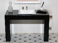 Black modern Basin unit with had rail & towel