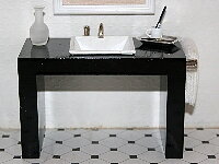 Black modern Basin unit with had rail & towel