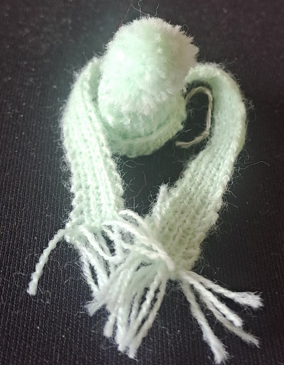 Lightgreen knitted hat and scarf