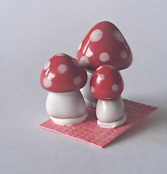 Mushrooms in creamics, red