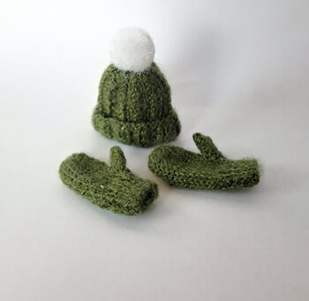 Green knitted hat and mittens