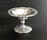 Fruit Bowl in white polished metal.