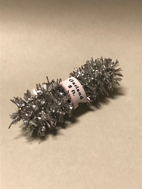 small package with tinsel
