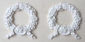 A pair of decorations rosette 2- hard casting plaster