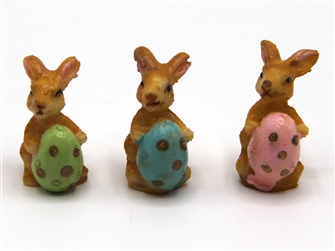 3 rabbits with egg