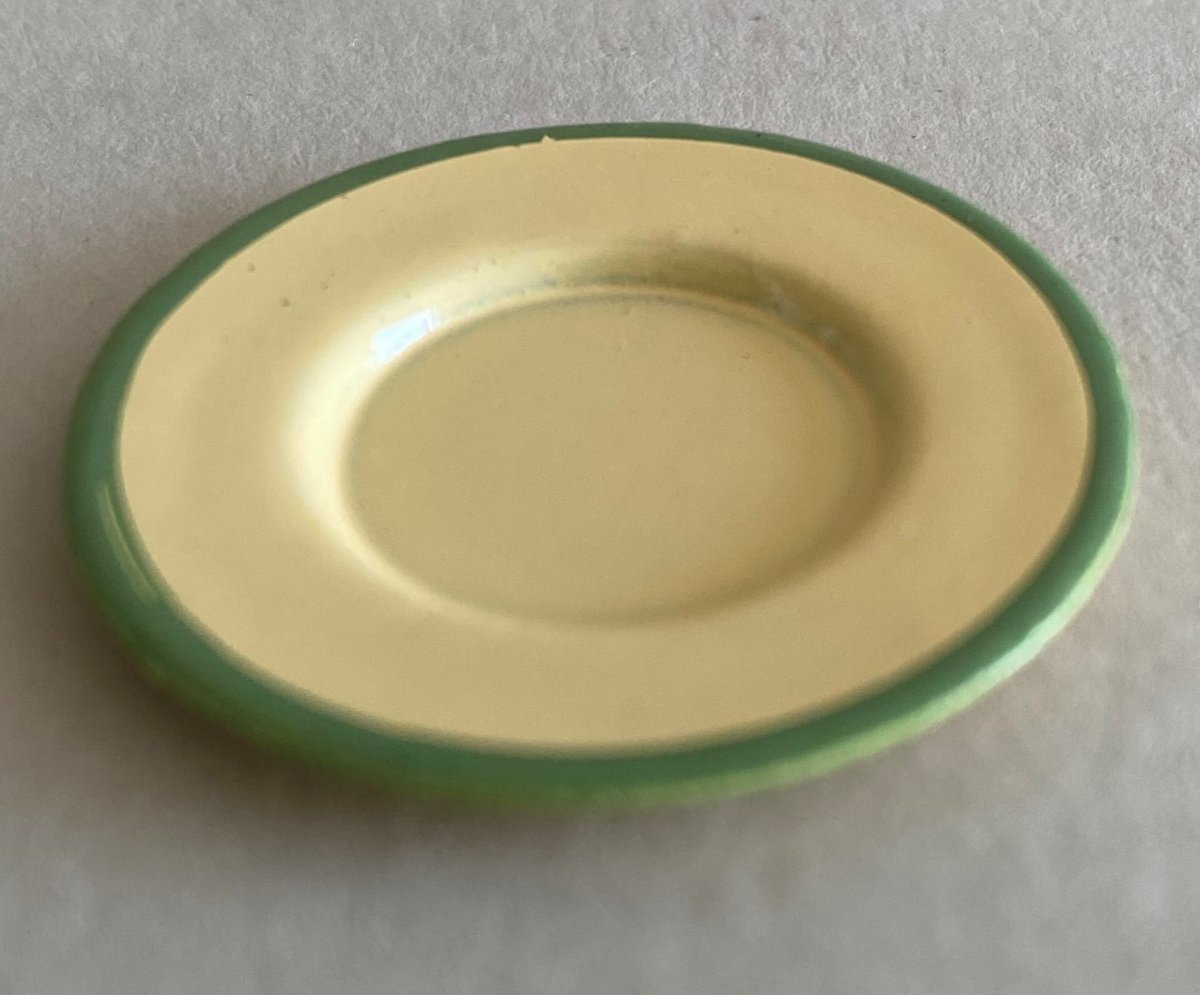 A plate, yellow with green edge, kockum