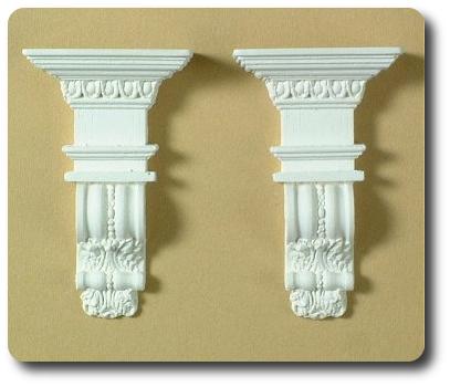 A pair of brackets - hard casting plaster