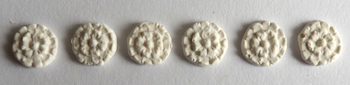 Six small rosettes - hard casting plaster