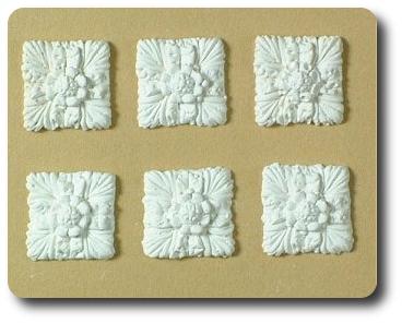 A set of six square rosettes - hard casting plaster