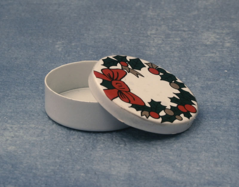 Tin with xmas bow