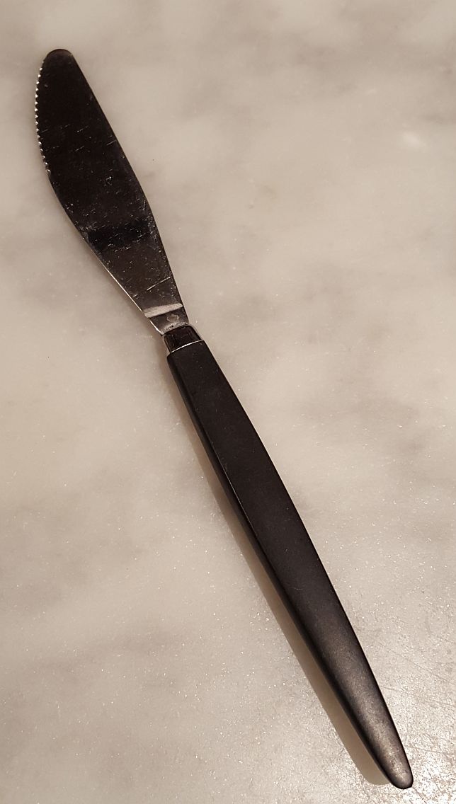 Spetsigt bakelitskaft krage kniv