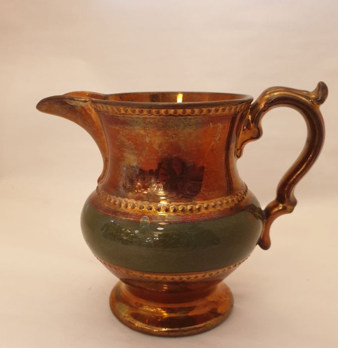 Small pitcher luster glaze and green