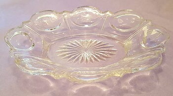 Eda Lornjett, pressed glass plate star in the bottom