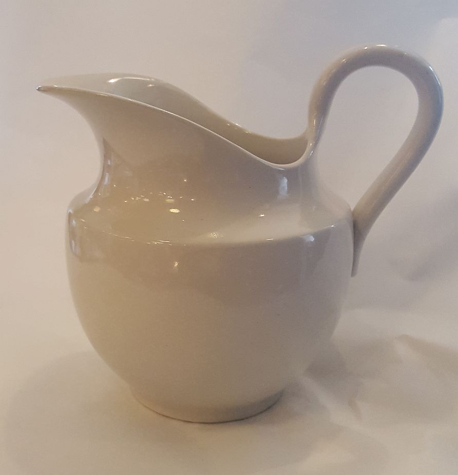 White washing pitcher