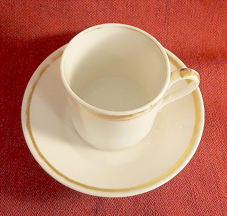 Coffecup and saucer white and gold 1830s - 2