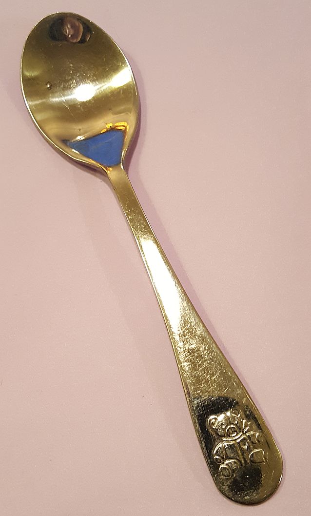 Teddy bear with heart spoon