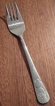 Teddy bear standing fork