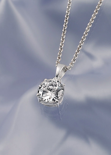Cubic zirconia encased in silver on a silver chain
