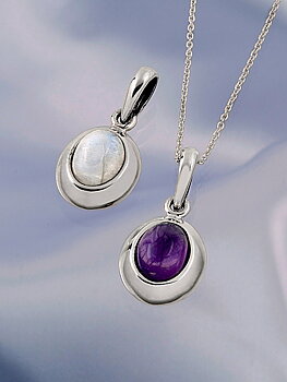 Moonstone and amethyst encased in silver
