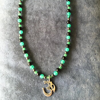 Green agate, onyx necklace with an aum